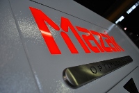 Close up of Mazak laser logo